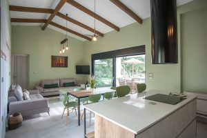 Villa arte with indoor dining and kitchen area