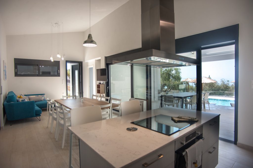 Villa Azzurro kitchen and living area with island seating, Kefalonia