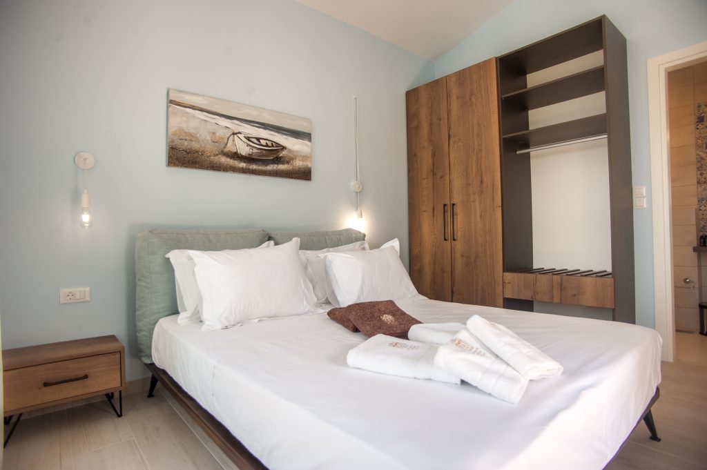Villa Azzurro bedroom with fitted wardrobe and en-suite access, Kefalonia