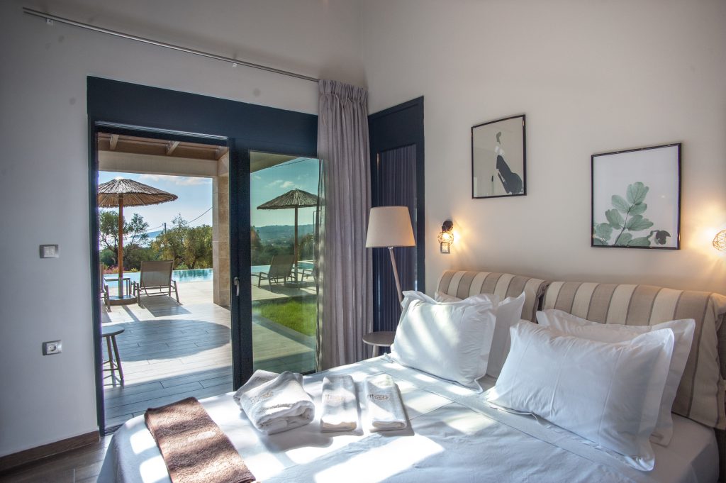 Villa Carisma double bedroom with pool-view terrace access, Kefalonia