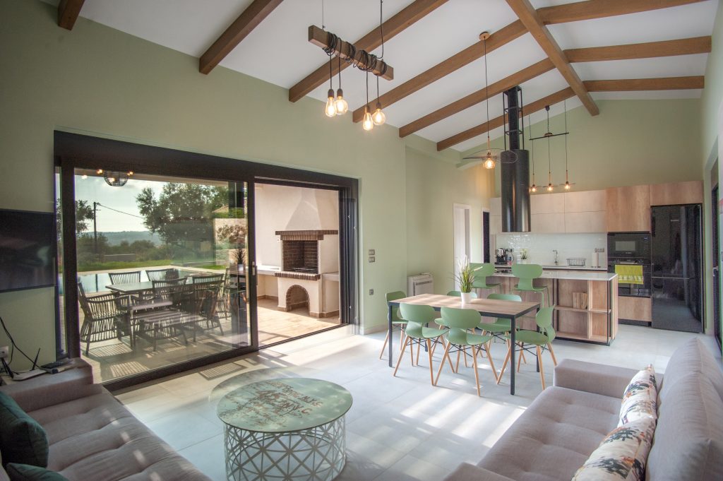 Living and dining area opening onto the terrace, Villa Arte, Kefalonia