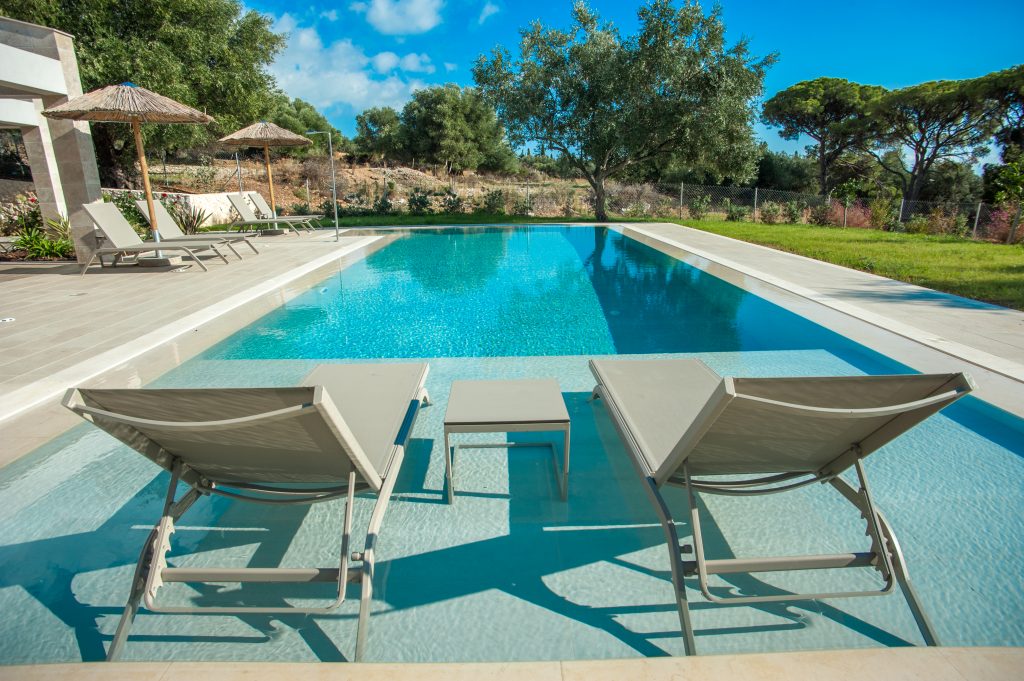 Pool with sun loungers by the water's edge, Villa Arte, Kefalonia