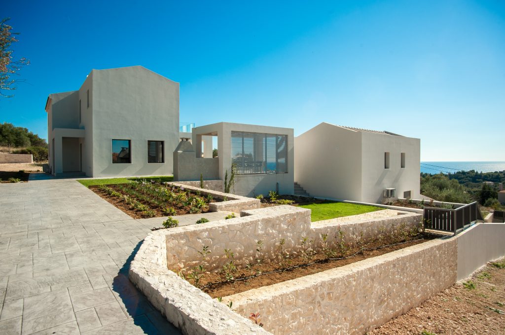 Villa Insieme two-building layout with landscaped grounds and sea views, Kefalonia