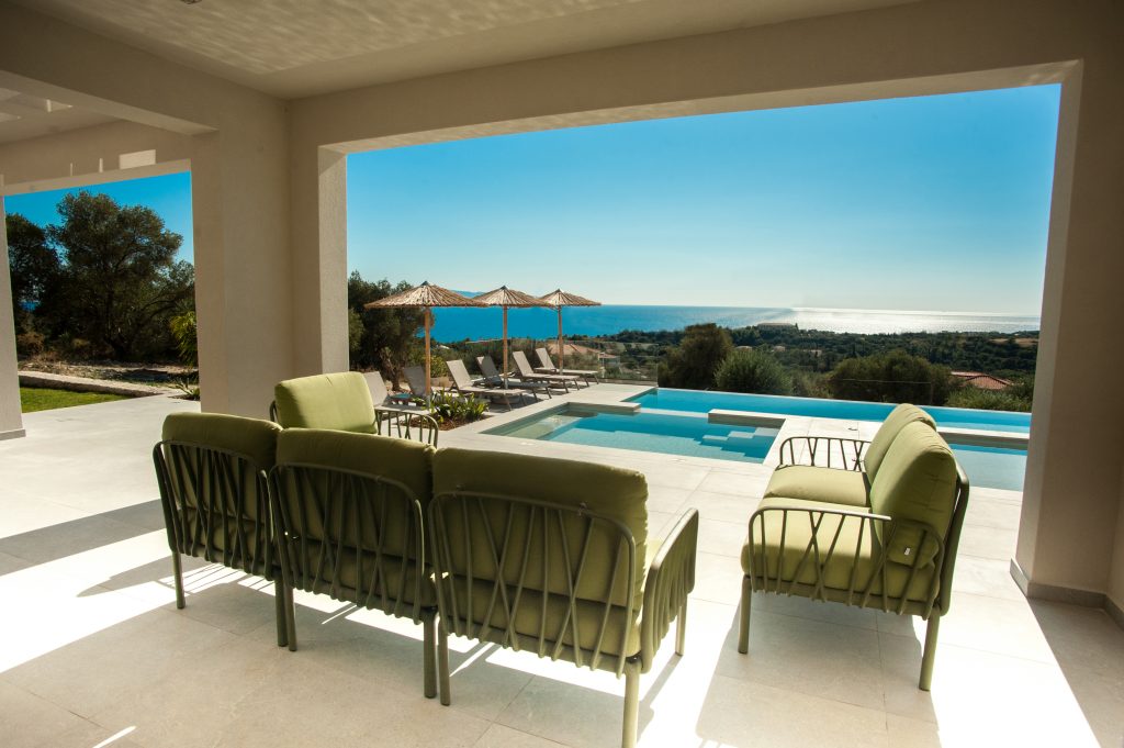 Villa Insieme covered terrace with sea views and lounge seating, Kefalonia