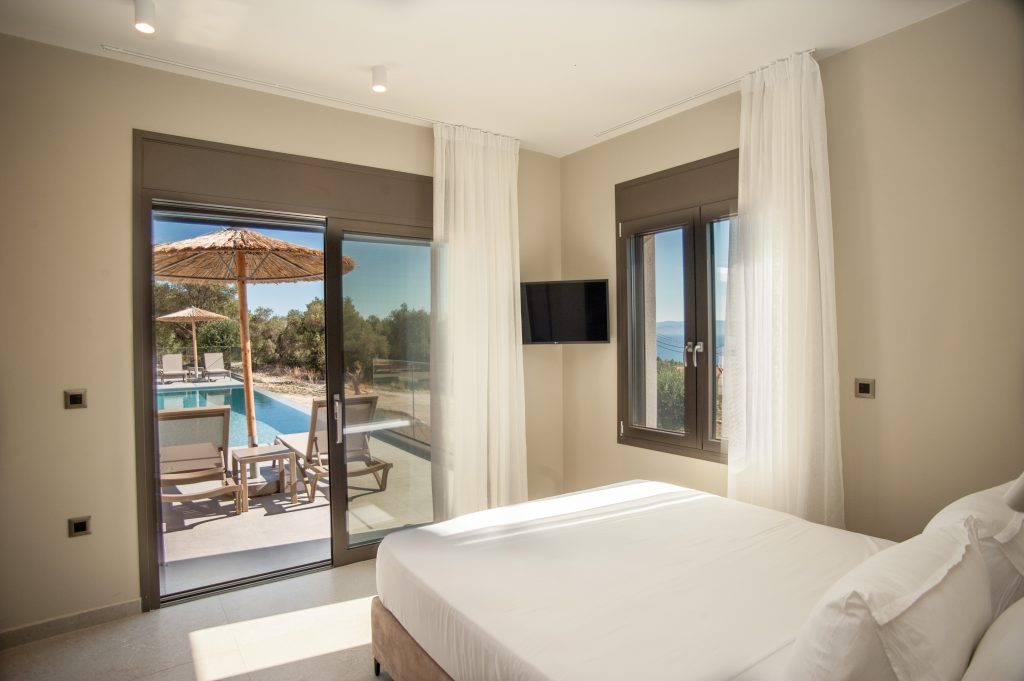 Villa Insieme bedroom with pool-view terrace access, Kefalonia
