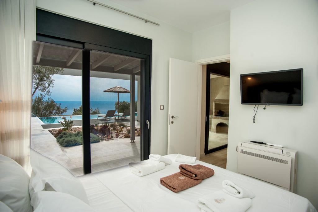 Villa Bambola bedroom with sea-view terrace access, Kefalonia