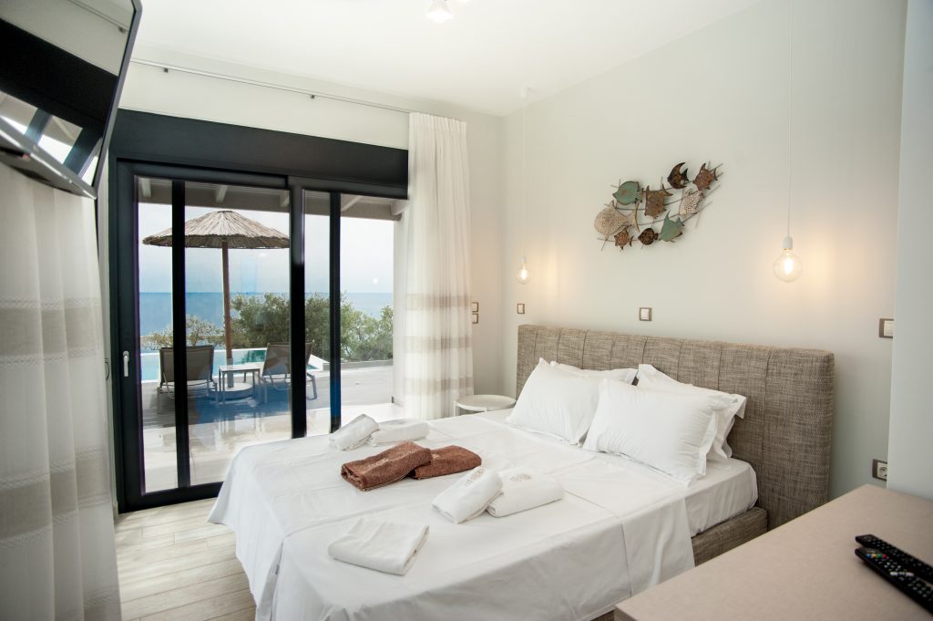 Villa Bambola bedroom with pool-view terrace, Kefalonia